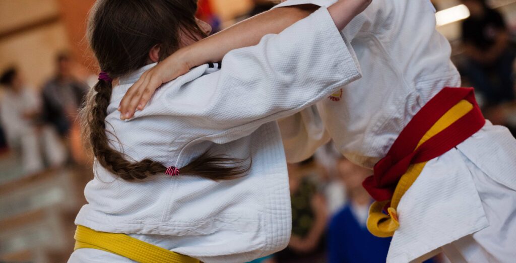 two children practicing judo